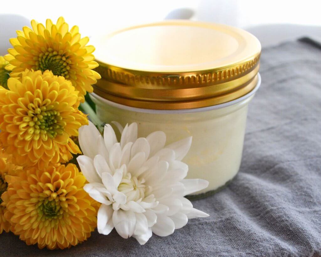 Calendula whipped tallow lotion in a glass jar made with grass-fed beef tallow