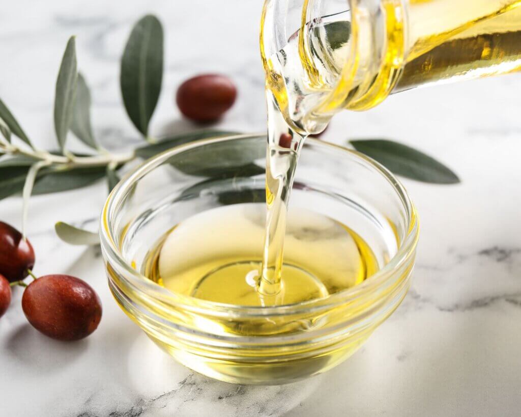 Jojoba oil used as a carrier oil in whipped tallow lotion for dry and sensitive skin