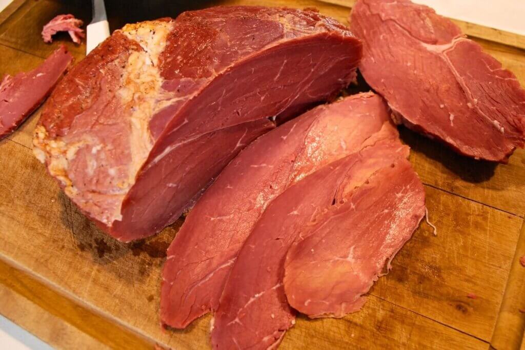 Close-up of thinly sliced homemade cured roast beef
