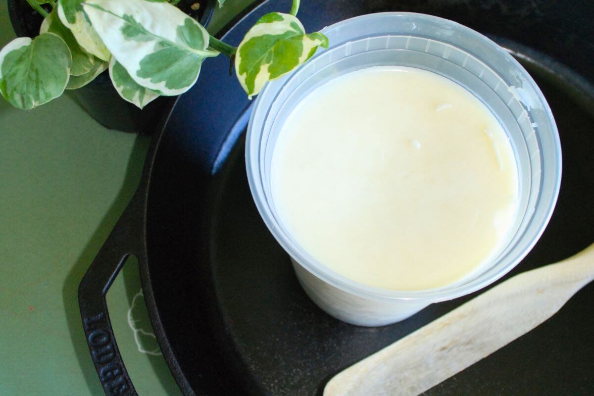 Finished homemade beef tallow in a container