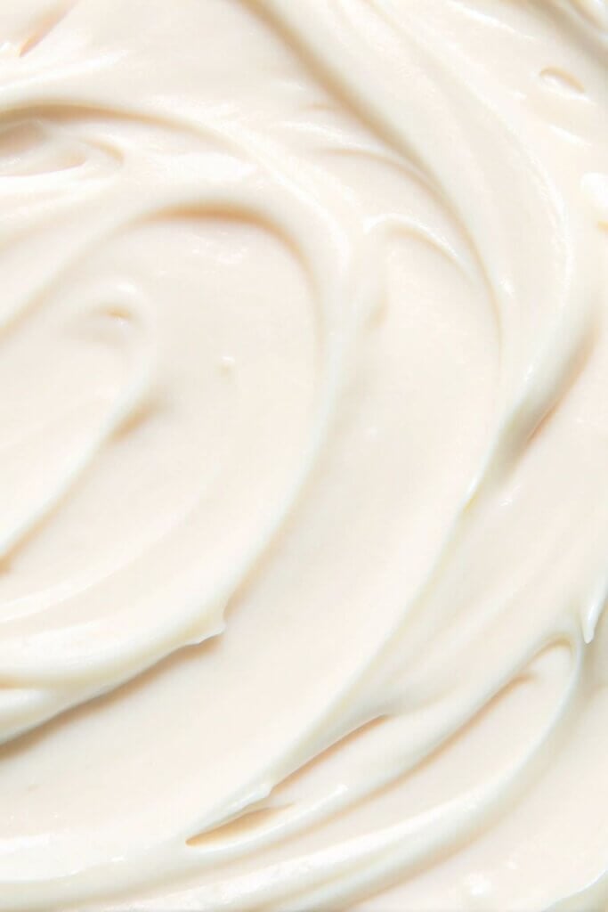Close-up of whipped beef tallow lotion made with jojoba oil and calendula-infused oil.