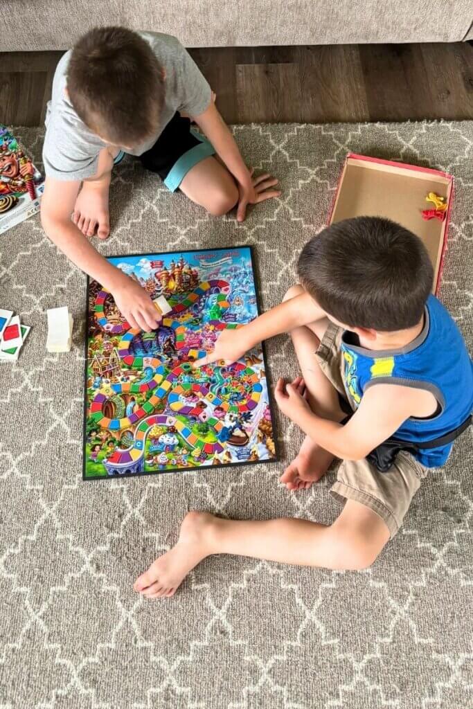 Children playing a board game at home during our five-day power outage